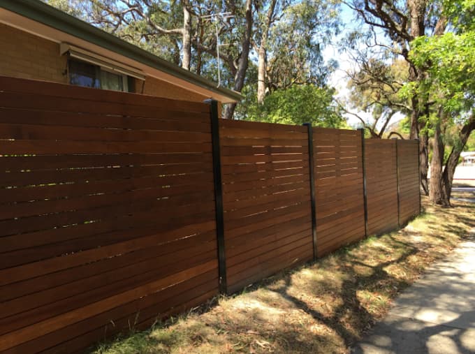 Levers Fencing — horizontal hardwood feature fence